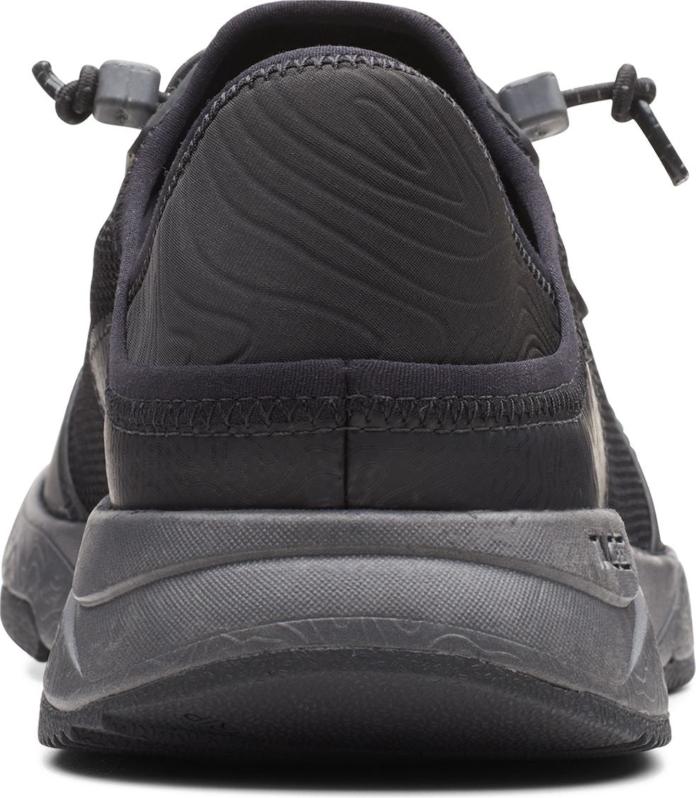 Back view of a gray shoe with a bungee cord closure.
