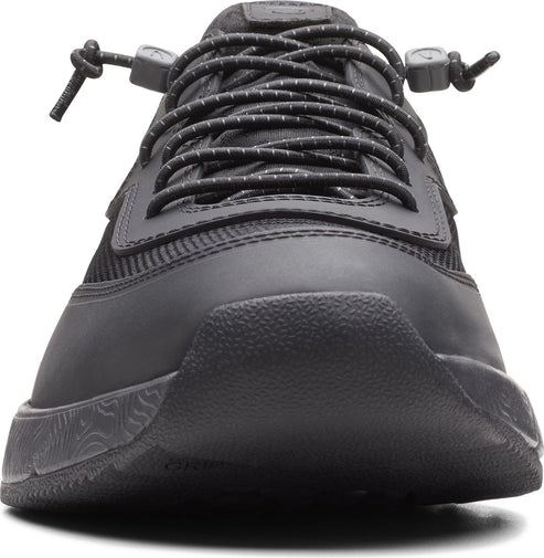 Front view of black shoe with patterned sole and lace.