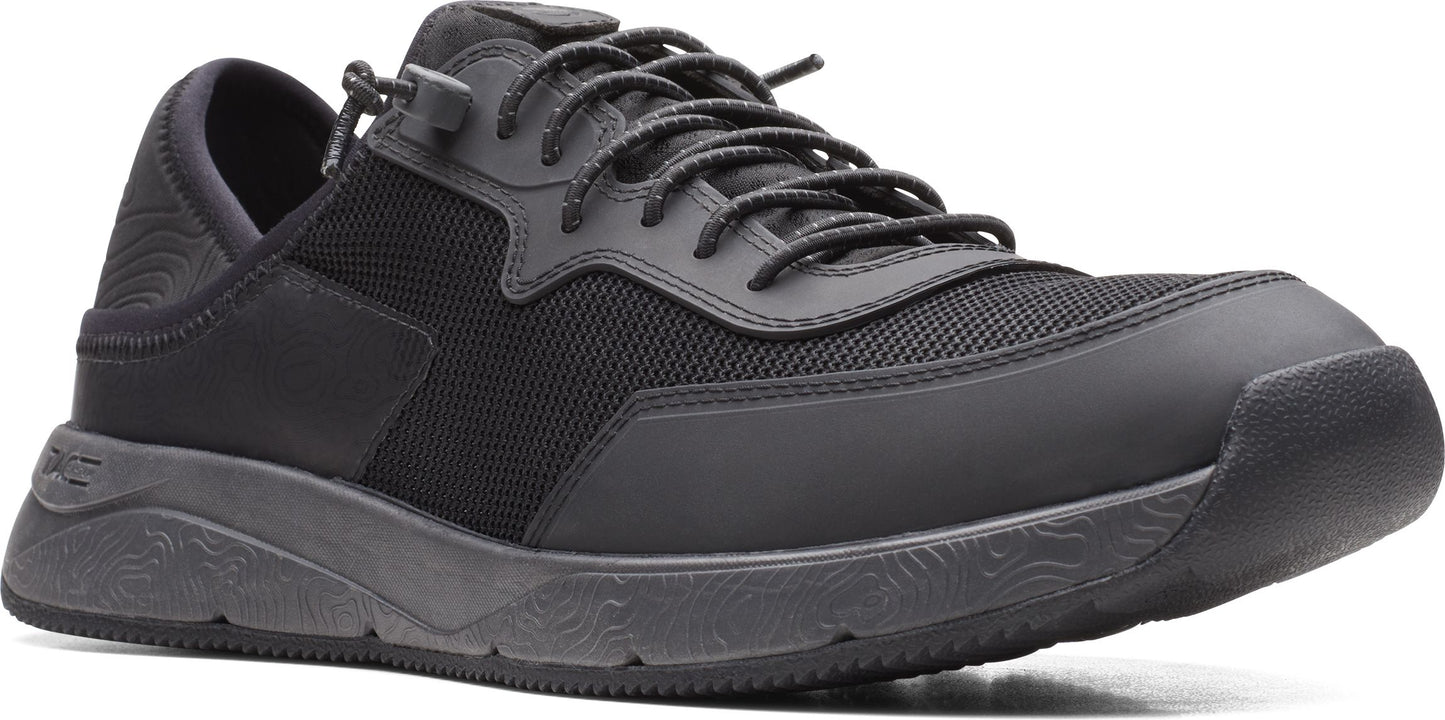 A black athletic shoe with a mesh upper and decorative sole.