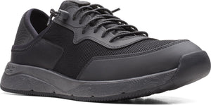 A black athletic shoe with a mesh upper and decorative sole.