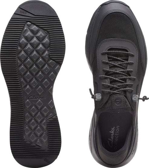Black shoe with black laces, and diamond pattern black sole.