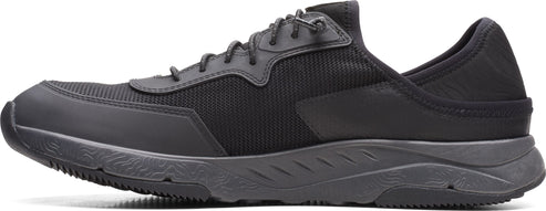 A black athletic shoe with black laces.
