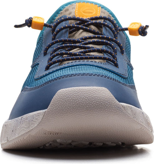 Blue casual shoe with cord laces, grey and patterned tongue, and thick sole.
