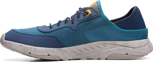 Low-cut blue running shoe with gray outsole and laces.