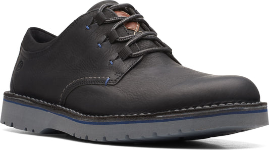 Black leather derby shoe with gray laces and sole.