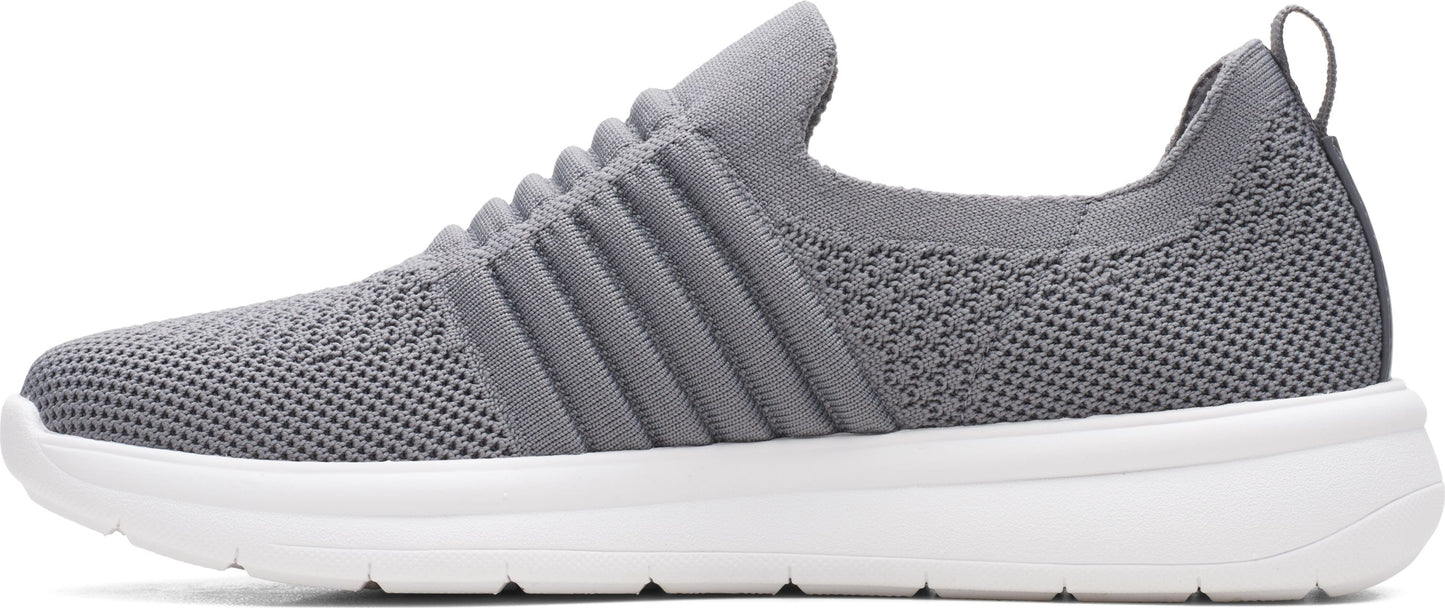 A grey knit shoe with a white sole.