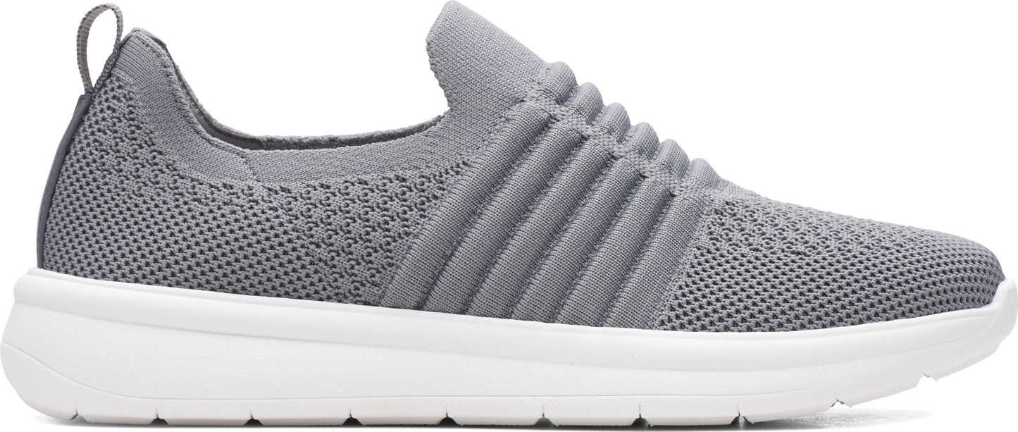 A grey, slip-on sneaker with a white sole and ribbed detailing across the upper.