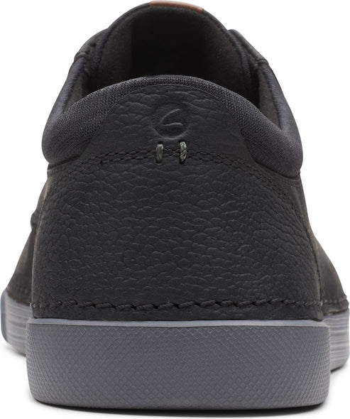 Back view of black casual leather shoe with gray sole.