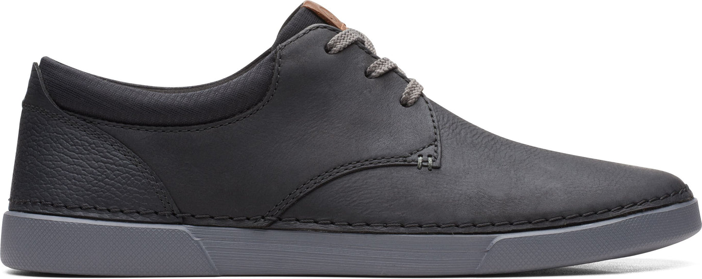 Black leather shoe with gray sole and gray shoelaces.