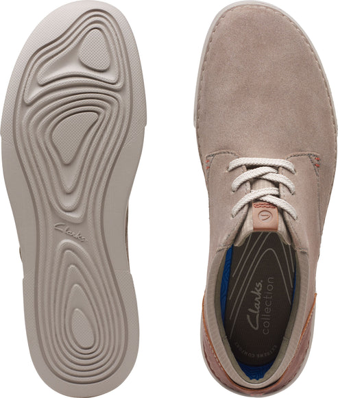 Tan suede shoe with cream laces seen from above and bottom view showing beige sole.