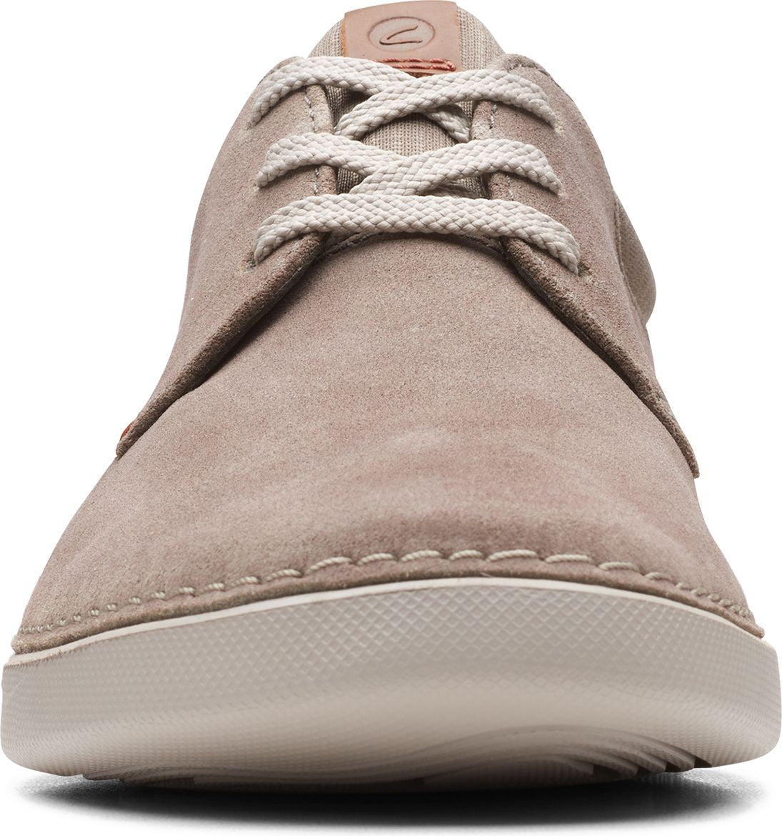 Beige suede shoe with beige laces and sole, seen from the front.