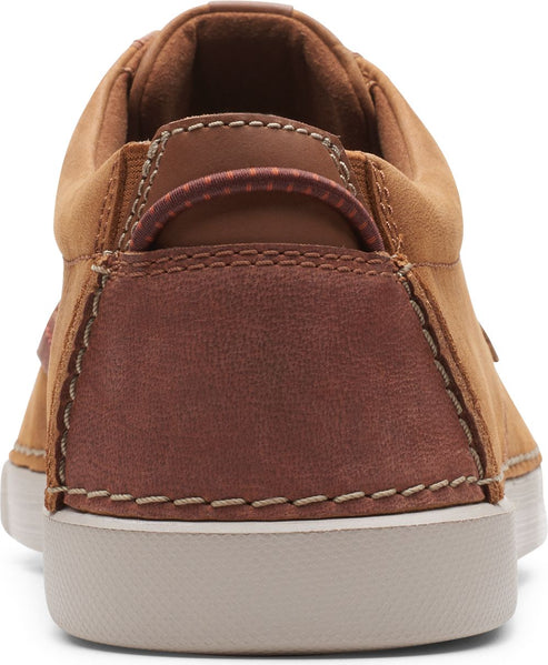 Tan leather lace-up sneaker with a dark brown heel and tan outsole.