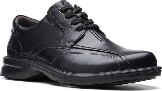 Black leather dress shoe with lace-up closure and rounded toe.
