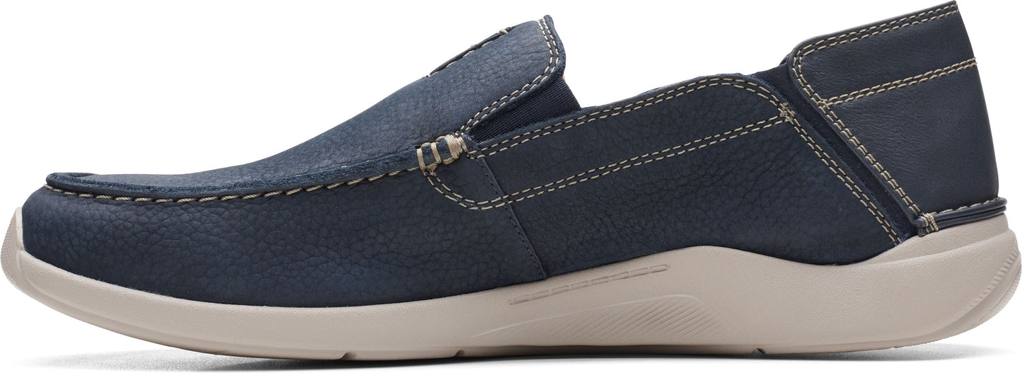 Slip-on navy shoe with contrast stitching.