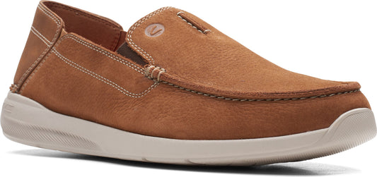 A tan-colored slip-on shoe with a white sole.