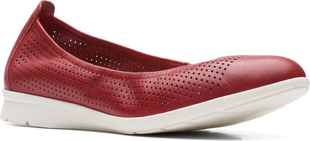 Red women's slip-on shoe with perforated detailing and a white sole.