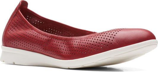 Red women's slip-on shoe with perforated detailing and a white sole.