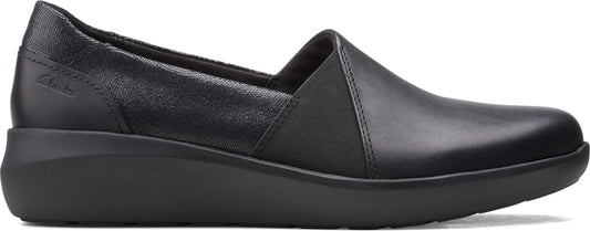 Black leather slip-on shoe with a thick sole.