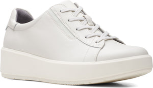 White leather platform sneaker with lace-up closure.