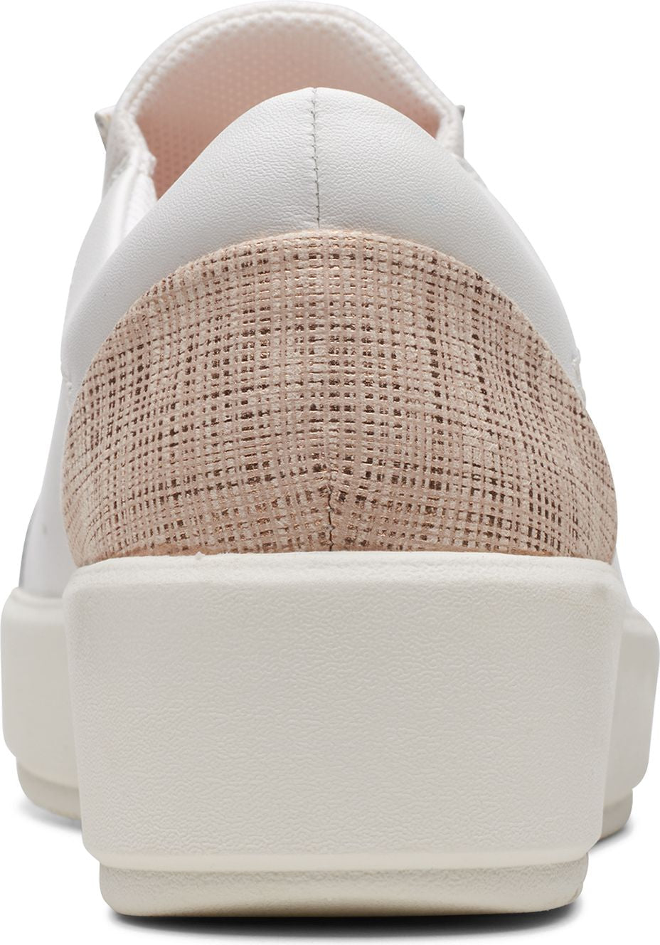 White slip on shoe with off white platform sole and textured tan fabric at heel.