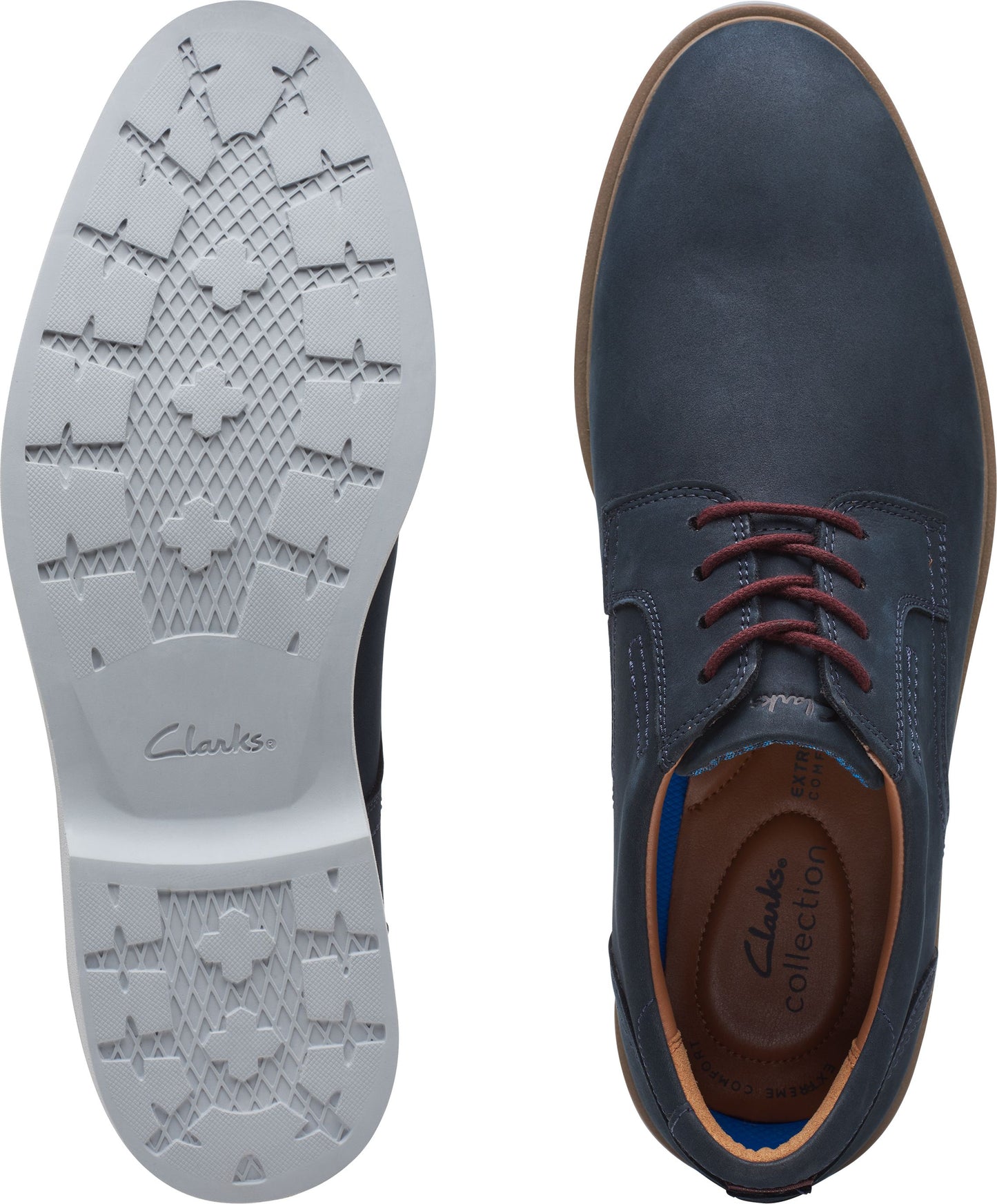 Top-down shot of blue leather dress shoe showing laces and sole. The insole reads "Clarks collection".