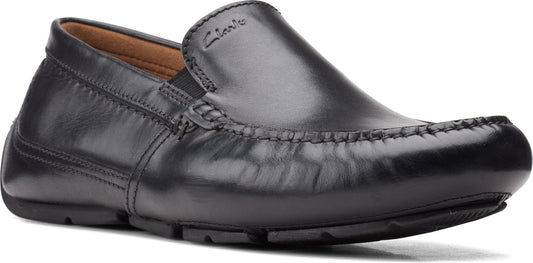 Black leather loafer with moccasin stitching.