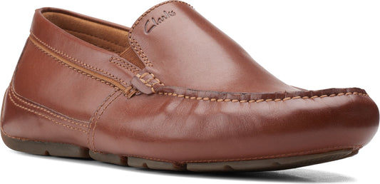 A brown leather loafer shoe with visible stitching.