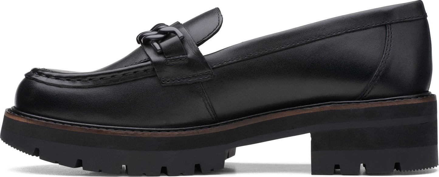 Black leather loafer with a chain-like detail on top and a thick lug sole.