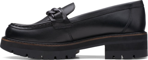 Black leather loafer with a chain-like detail on top and a thick lug sole.