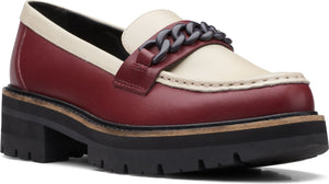 Two-toned, maroon and off-white heeled loafer with a chunky chain strap.