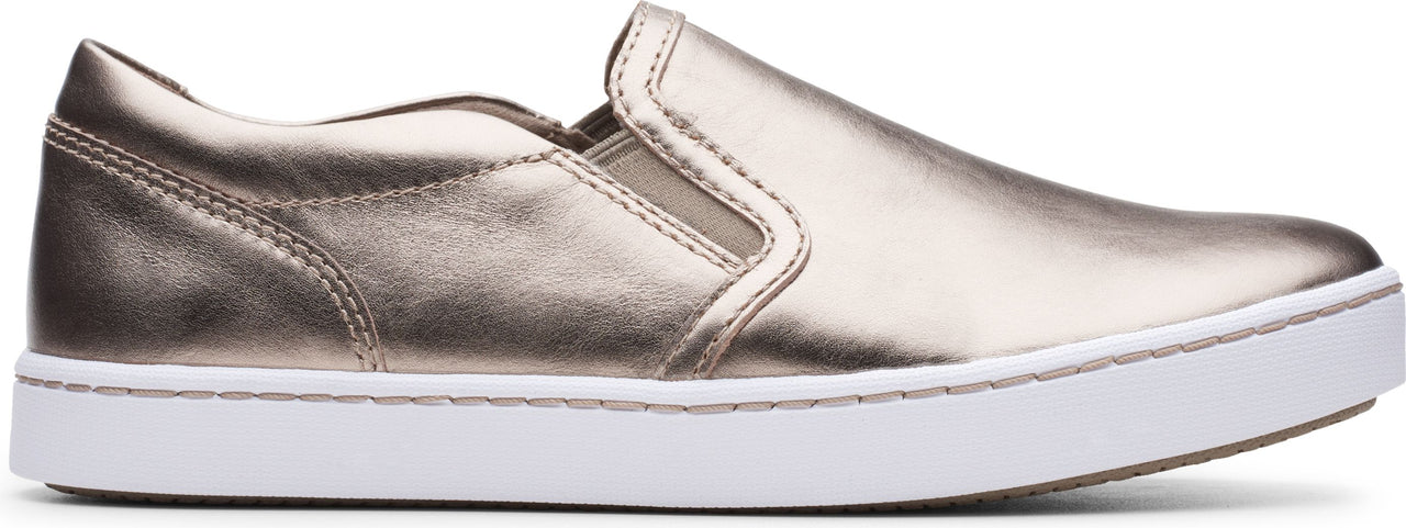 Metallic slip-on shoe with a white sole.