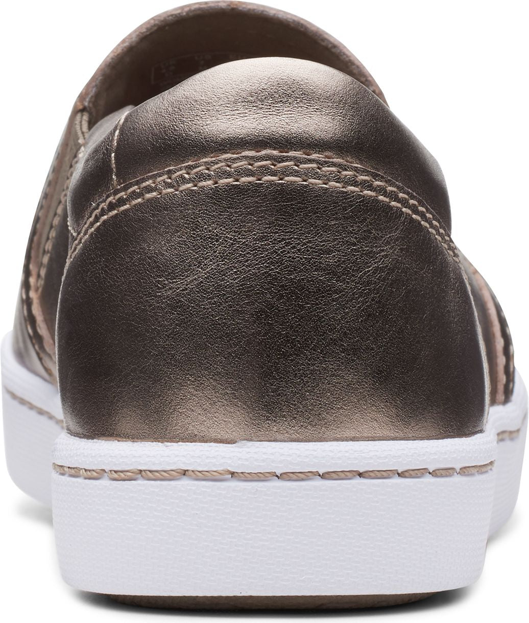 Metallic gold slip-on shoe with white sole, view from back.