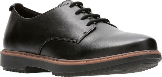 A black, leather oxford shoe with black laces and a thick sole.