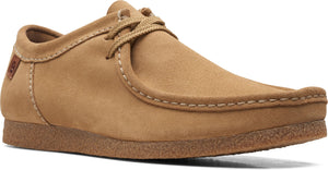 Tan suede shoe with front lacing and a crepe sole.