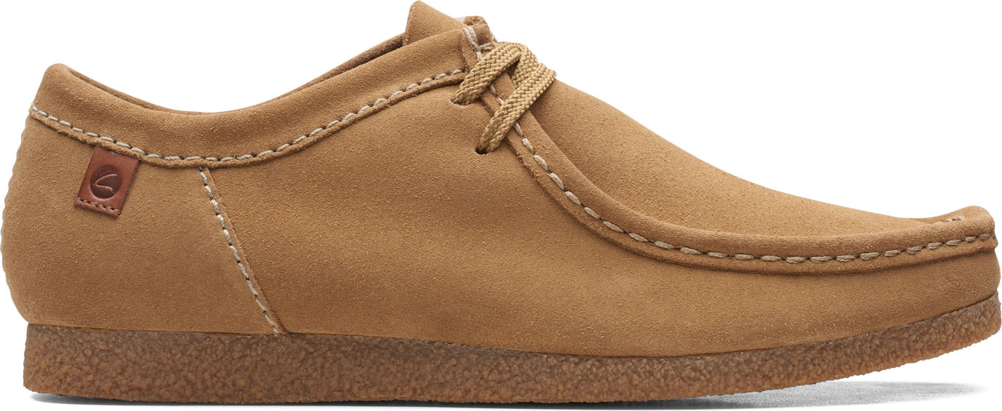 A low-cut, tan-colored moccasin-style shoe with a lace-up closure and a textured rubber sole.