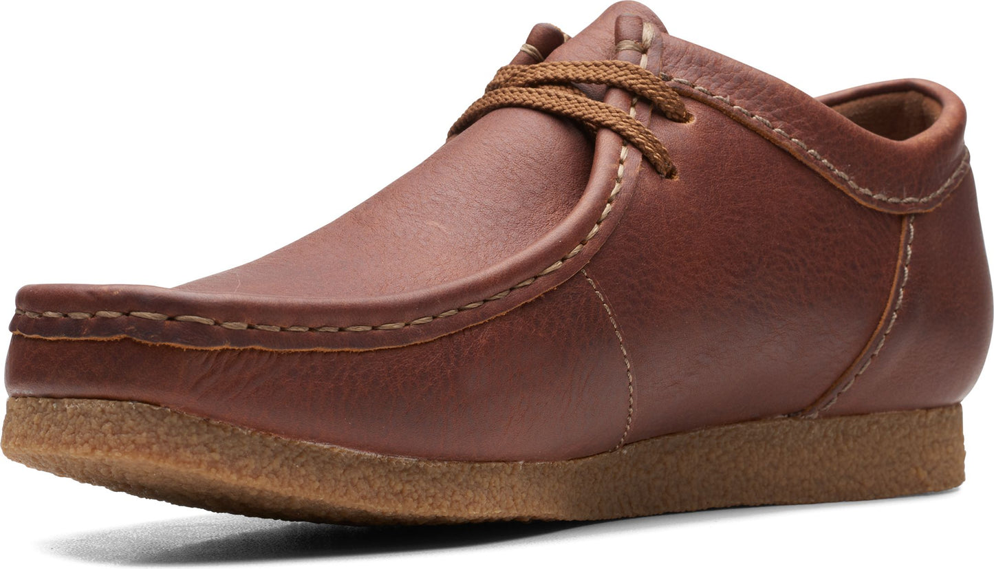 Brown leather moccasin shoe with brown laces and light brown sole.