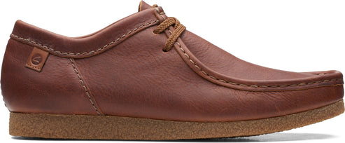 A brown leather shoe with a lace-up closure.