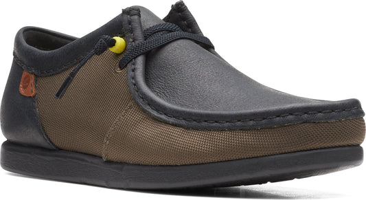 Low profile shoe with a black sole, black leather trim, brown canvas sides, and black laces with a yellow bead.
