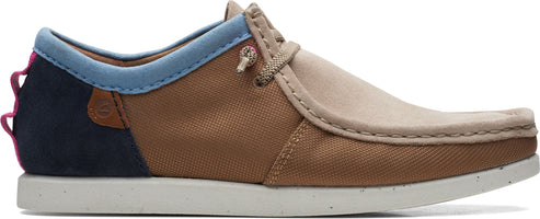 A casual shoe with beige suede upper, brown canvas sides, blue and navy heel, and a white sole.