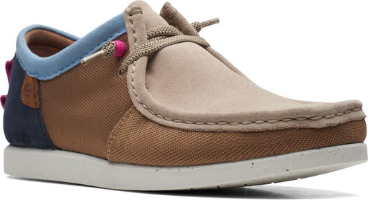 Low-profile shoe with beige suede toe, brown canvas side, light blue ankle trim, navy blue heel, and speckled white sole.