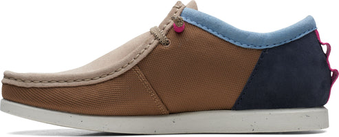A low cut shoe with brown and beige canvas uppers and a white sole.