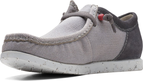 A grey casual shoe with a speckled white sole and grey laces.