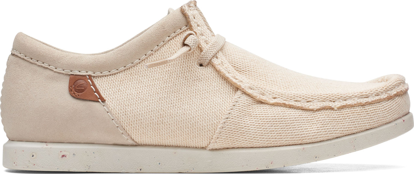 Tan casual shoe with tie closure.