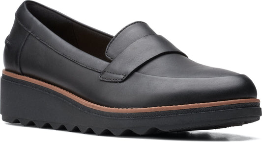 Black loafer with a wedge sole.
