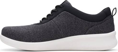 A low top grey sneaker with black trim and a white sole.