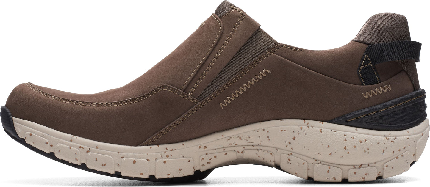 Slip-on brown shoe with a beige speckled sole.