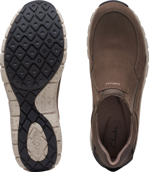 Slip-on brown casual shoe with black sole.