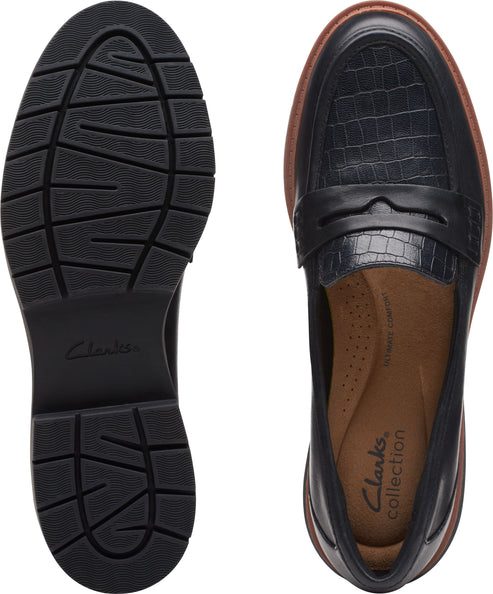 A pair of black leather loafers, one showing the treaded sole and the other showing the top with a crocodile print detail.