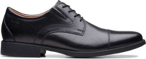A black cap-toe dress shoe.