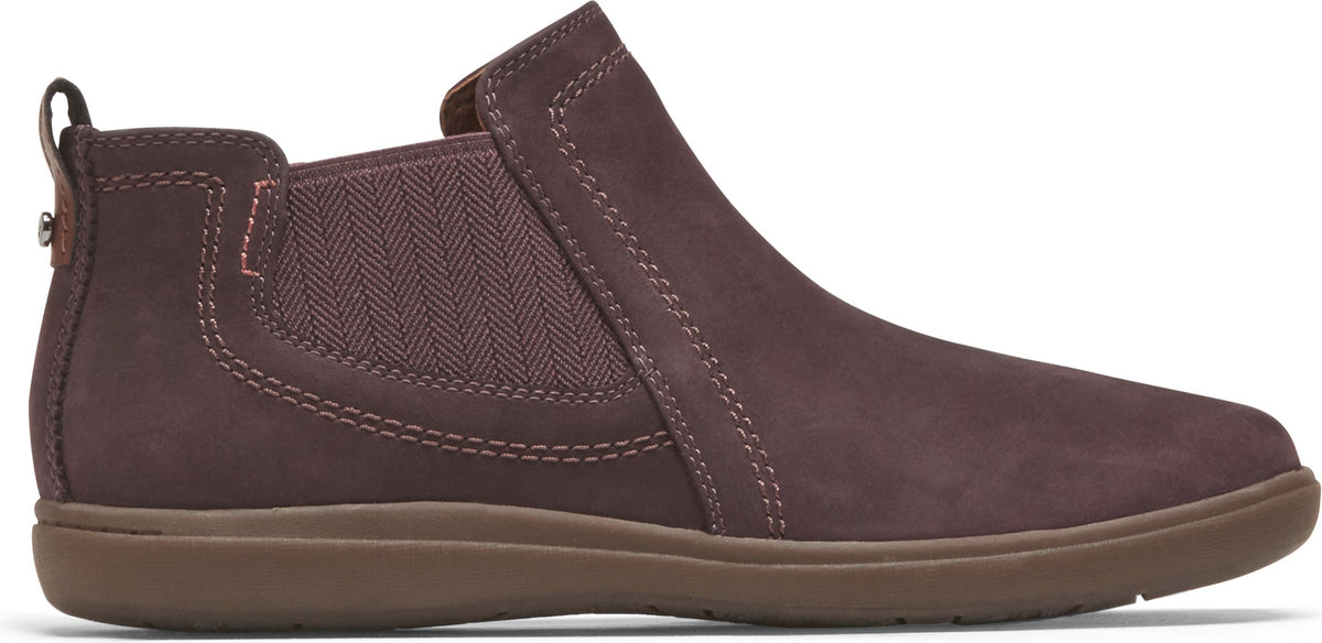 A plum-colored leather boot with elastic side panels and a brown sole.